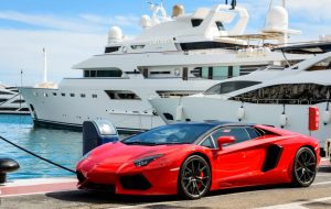 Data matching lifestyle assests like this red sports car and luxury boats as shown in photo