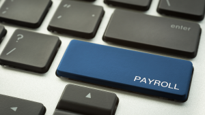 Keyboard with the shift key replayed with one stating payroll. Image reflects STP Phase 2 common mistakes the ATO is seeing.