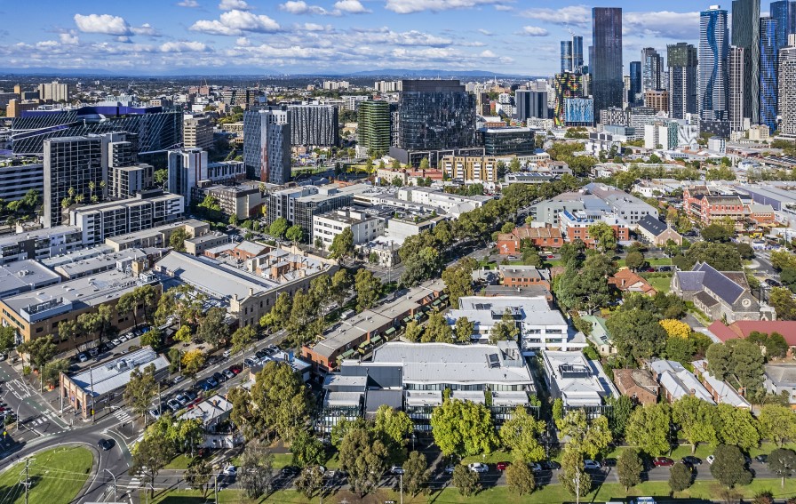 Foreign investors will soon be paying more for housing under a government plan to boost housing stock for Australians. Aerial view of city.